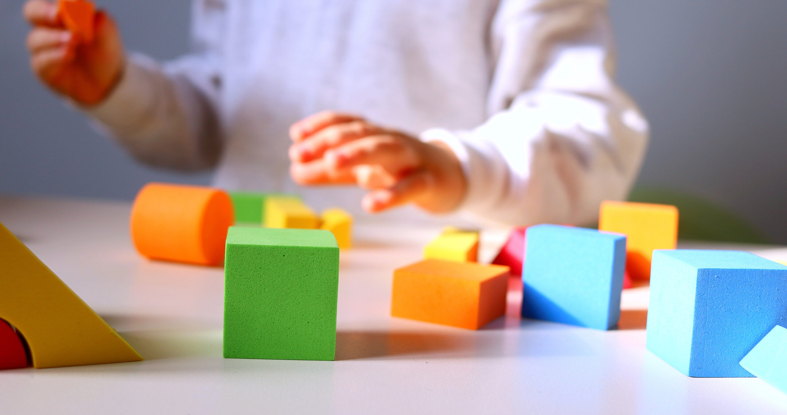 Children's,Playful,Colored,Geometric,Shapes,Close-up,On,A,Light,Table